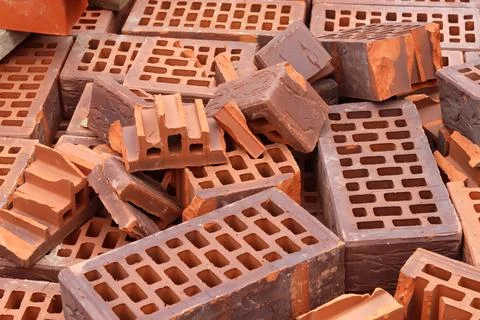 Broken ceramic bricks close up. Broken brick. selective focus Stock Photos
