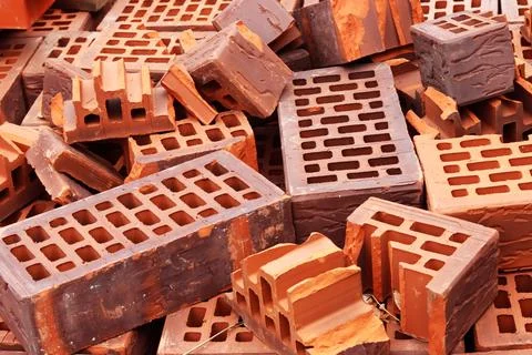 Broken ceramic bricks close up. Broken brick. selective focus Stock Photos