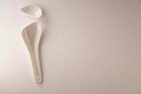 Broken ceramic  spoon Foto stock