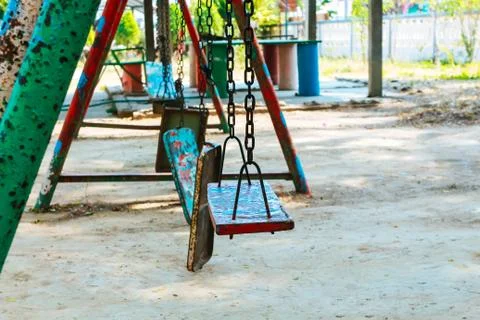 Broken chain swing. Stock Photos