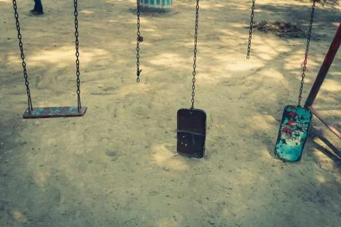 Broken chain swing. Stock Photos