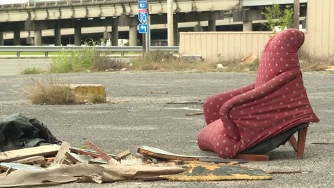 Broken chair on ground Stock Footage 84513043