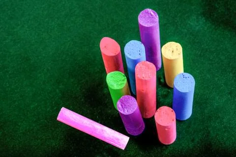 Broken Chalk on Green Stock Photos