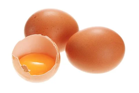 Broken chicken egg isolated on white background. Stock Photos