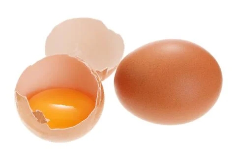 Broken chicken egg isolated on white background. Stock Photos