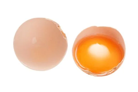 Broken chicken egg isolated on white background. View from above. Stock Photos
