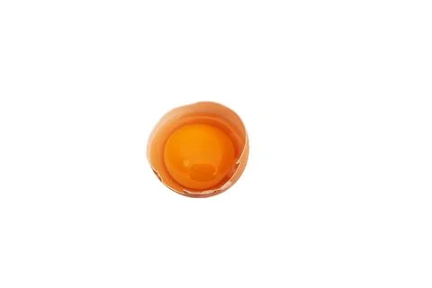 Broken chicken egg on a white background. Stock Photos