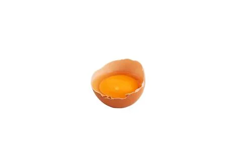 Broken chicken egg on a white background. Stock Photos