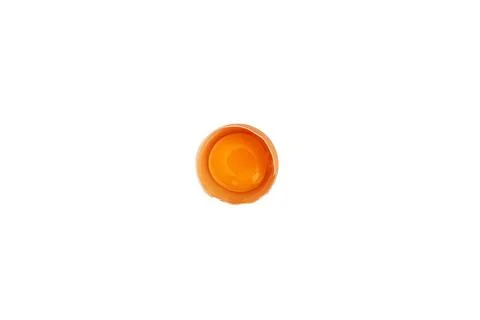 Broken chicken egg on a white background. Stock Photos