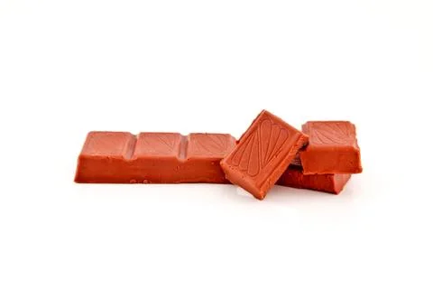 Broken chocolate bar on a white background Foto stock
