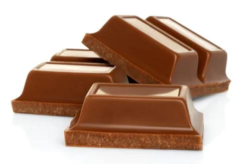 Broken chocolate bars on white background Stock Photos