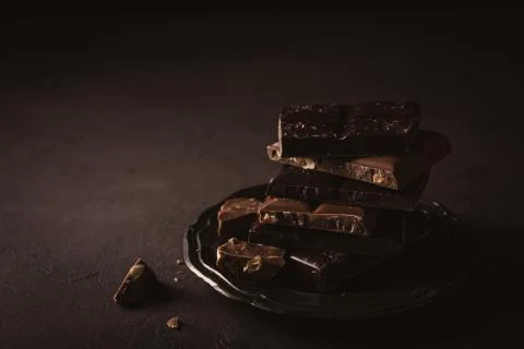 Broken chocolate pieces Stock Photos
