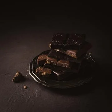 Broken chocolate pieces Stock Photos