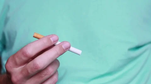 Broken cigarette and the thumb Stock Footage 81856784
