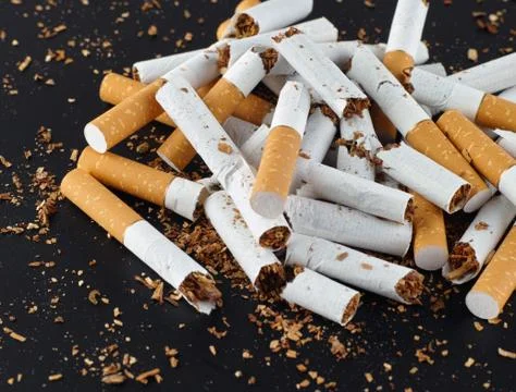 Broken cigarettes closeup Stock Photos