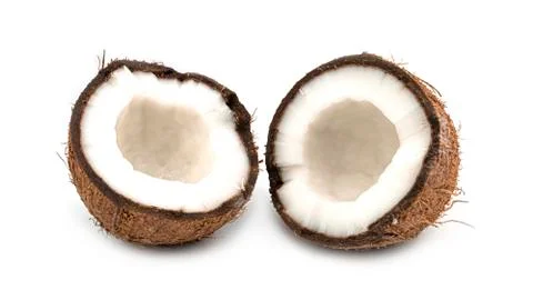 A broken coconut on a white background. Macro photo. Stock Photos
