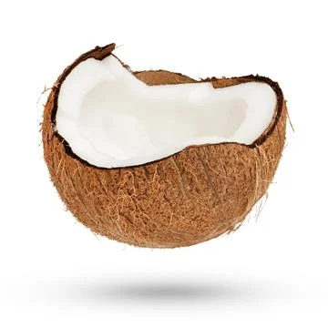 Broken coconut on a white isolated background. Half of a coconut, flesh side up Stock Photos