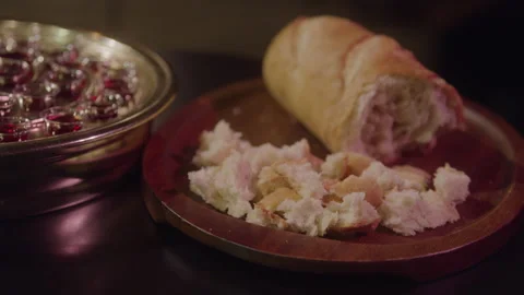 Broken Communion Bread and Wine Stockbeeldmateriaal 208801836