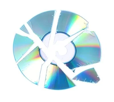 Broken compact disc isolated on white, top view Stock Photos