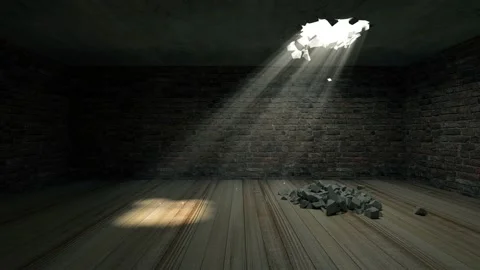 Broken concrete celling in the empty room with sunlight rays through the hole Stock Footage 166946835