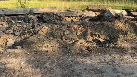 Broken concrete slabs and debris at demolition site Видео 338361586