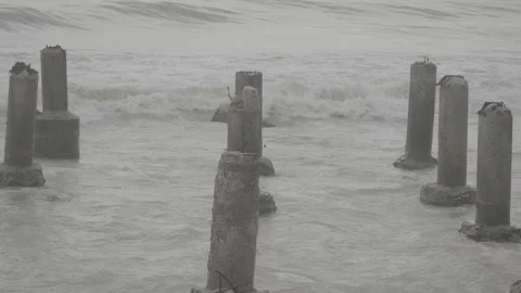Broken Concrete Structure in Middle of Ocean Hit by Powerful Waves S-Log3 Stock Footage 313092972