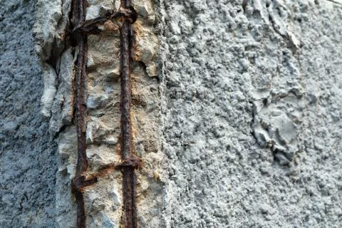 Broken Concrete Wall and Rusty Bar Steel. Stock Photos
