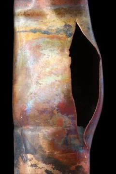 Broken copper pipe Stock Photos