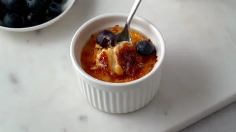 Broken, cracked crust of traditional French cream dessert. Burned Trinity or Stock Footage 151404953