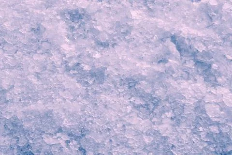 Broken crushed ice fresh cold white winter snow background Stock Photos