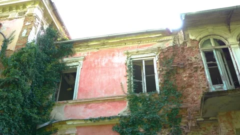 Broken damaged and rotten old villa in countryside area Stock Footage 171590845