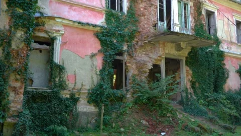 Broken damaged and rotten old villa in countryside area Stock Footage 171590938