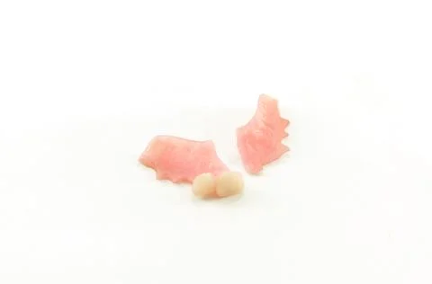 Broken denture Stockfoto's