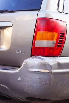 Broken dirty rear bumper grey Crossover Stock Photos