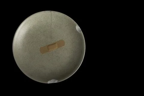 A broken dish on a black background Stock Photos