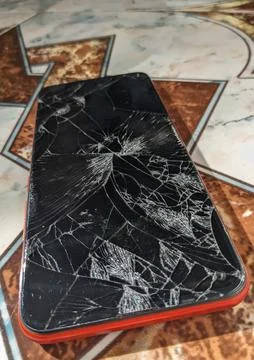 Broken display, close-up screen of a touchscreen phone. Stock Photos