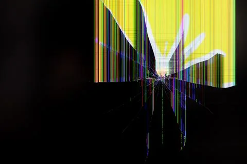 Broken display screen featuring prominent radial cracks and vibrant color p.. Stock Photos