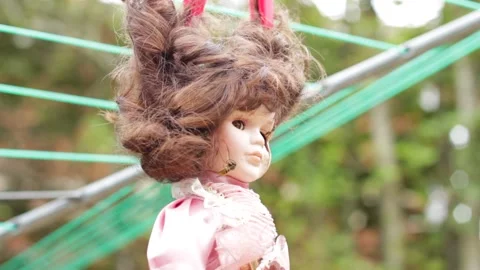 Broken Doll hanging Stock Footage 143115515
