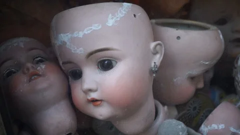 Broken dolls in detail Stock Footage 86132334