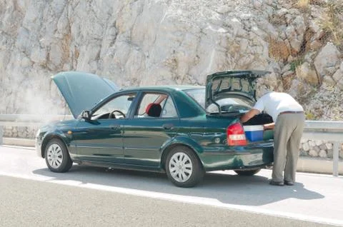 Broken-down car on the roadside Stock Photos
