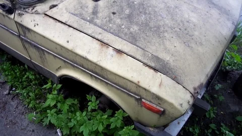 Broken-down old car standing in the yard Stock Footage 75962968
