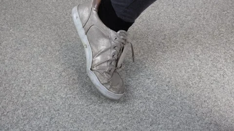 Broken down shoe with soles coming off on the sides, establisher Stock Footage 287130240