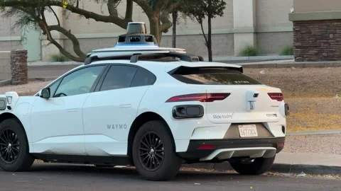 Broken down Waymo self driving car being towed Stock Footage 336590678