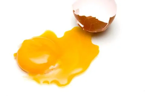Broken egg isolated on white background Stock Photos