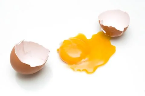 Broken egg isolated on white background Stock Photos