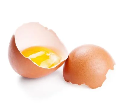 Broken egg isolated on white Foto stock