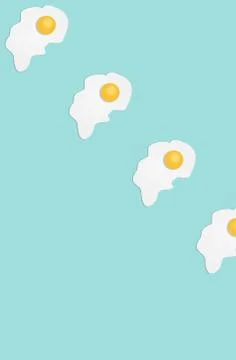 Broken egg on a light blue background 스톡 일러스트