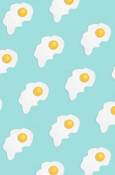 Broken egg on a light blue background Stockillustratie