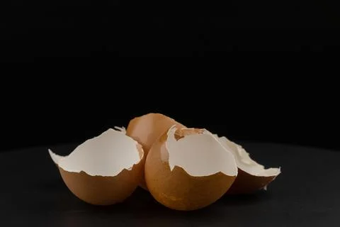 Broken of egg shell group crack  isolated on black background Foto stock