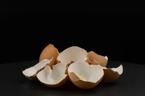 Broken of egg shell group crack  isolated on black background Stock Photos